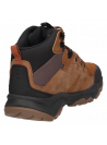 Calzado de trekking waterproof en cuero café, diseñado para aventuras urbanas y al aire libre.