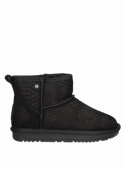 Botín casual negro de cuero para mujer, con caña de 12 cm y confort en cada paso.