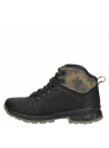Elegante botín outdoor negro de hombre, mezcla de cuero y textil, ideal para climas lluviosos.