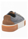 detalles en cuero y textil de la zapatilla azul casual de mujer, ideal para un look diario y actividades urbanas.