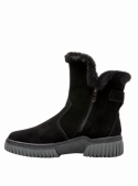 Botín casual negro para mujer, diseño minimalista con ribete cálido, adecuado para paseos urbanos en invierno.