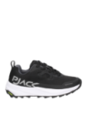 Moderna zapatilla negra de mujer, estilo athleisure, perfecta para combinar con ropa casual o deportiva.