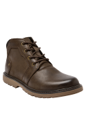 Calzado masculino de cuero marrón, estilo casual, con suela gruesa antideslizante, perfecto para un atuendo versátil.