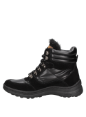 Botín negro de mujer con parte superior de cuero y borde acolchado, perfecto para caminatas urbanas en invierno.