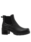 Botín Chelsea negro de mujer, ajustado al tobillo, ideal para ocasiones casuales y actividades diarias en la ciudad.