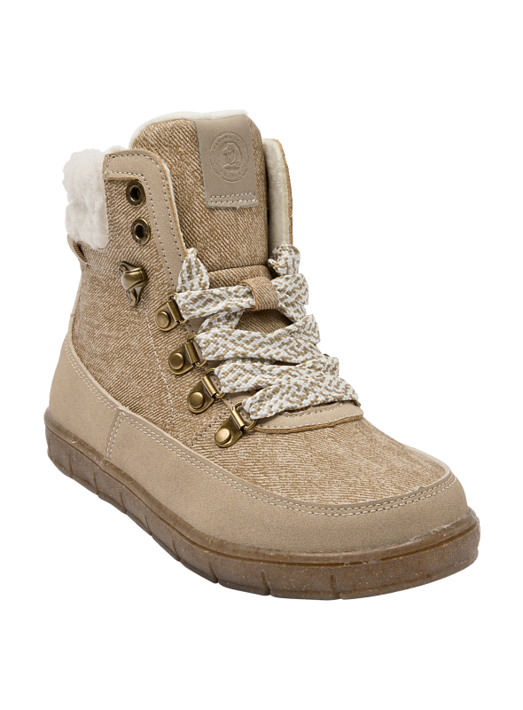 Suela gruesa del botín beige para niña, proporcionando estabilidad y tracción para actividades al aire libre.