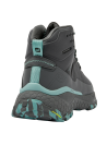 Bota de senderismo gris para mujer, suela todoterreno con tracción y estabilidad en superficies desafiantes.