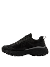 Calzado negro femenino de estilo trail running, con lengüeta reforzada y diseño urbano, ideal para uso diario.