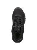 Calzado outdoor negro de mujer, suela todoterreno ideal para senderismo y climas lluviosos.