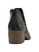 Botín negro de cuero para mujer, estilo casual chic, con diseño elegante y minimalista, ideal para ocasiones informales.