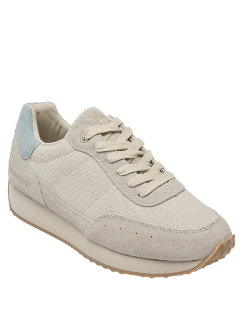 Zapatilla blanca casual de mujer en cuero y textil, ideal para actividades diarias.