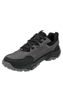 Zapatilla outdoor gris de cuero/sintético con forro de mesh, punta redonda, comodidad y estabilidad en cada paso.