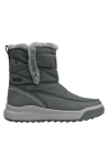 Bota azul de mujer sin cordones, fácil de poner y quitar, práctica para uso diario en climas fríos.