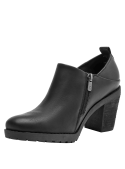 Botín negro de cuero para mujer, con suela de goma antideslizante, perfecto para outfits casuales o semi formales.