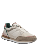 Zapatilla beige de mujer, ideal para uso prolongado, suela ligeramente levantada en el talón para pisada suave.