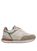 Zapatilla de cuero y textil beige, diseño retro con líneas curvas, lengüeta y cuello acolchonado para mayor comodidad.