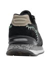 Zapatilla negra casual de mujer, cuero y textil, diseño clásico, ideal para uso diario por su comodidad.