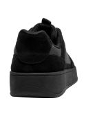 elegante zapatilla de cuero negro para hombre, ideal para looks casuales y semiformal