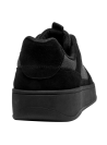 elegante zapatilla de cuero negro para hombre, ideal para looks casuales y semiformal