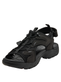 sandalia negra de cuero para hombre con correas ajustables y detalles de malla para ventilación y adaptabilidad.