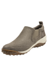 Zapatilla taupe de cuero para mujer, minimalista y versátil, con textura mate suave y elásticos laterales.
