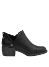 Botín de cuero negro minimalista para mujer, versátil para combinaciones casuales y urbanas.