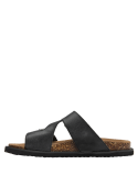 Elegante sandalia de cuero negro, estilo casual, con textura lisa y hebillas metálicas.