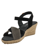 Alpargata de mujer negra en cuero con tiras cruzadas texturizadas y cuña de yute estilo boho-chic.