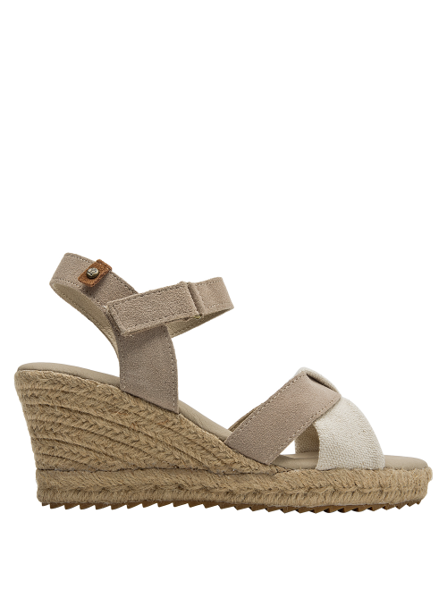 Alpargata de mujer beige en cuero y lona con tiras cruzadas, estilo casual y boho chic.