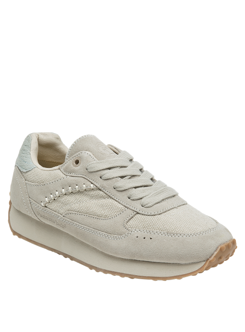 zapatilla de cuero beige para mujer, ideal para looks minimalistas y versátiles