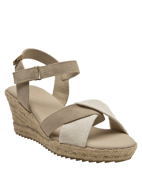 Alpargata de mujer beige en cuero y lona con tiras cruzadas, estilo casual y boho chic.