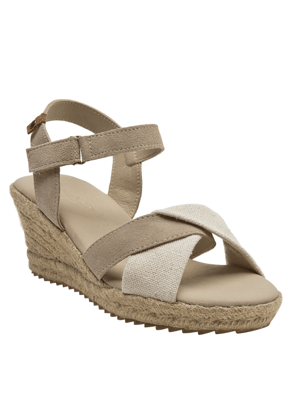 Alpargata de mujer beige en cuero y lona con tiras cruzadas, estilo casual y boho chic.