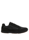 zapatilla negra de hombre combinable con jeans o pantalones cargo para un look relajado.