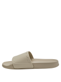 Sandalia casual beige con diseño elegante y suela plana para comodidad diaria.