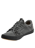 zapatilla monocromática de hombre estilo casual con cordones y suela de goma contrastante