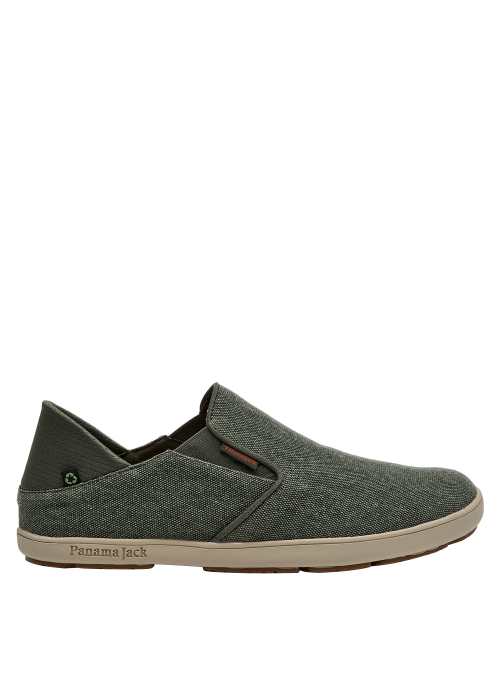 Calzado masculino urbano en gris oscuro, textil con etiqueta discreta, suela beige contrastante.