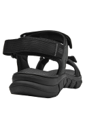 Calzado masculino negro estilo outdoor con textura resistente y suela adecuada para diversas superficies.