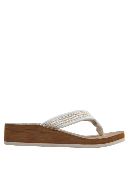 Sandalia bohemia de mujer en color blanco con base de corcho y detalles tejidos, ideal para verano.