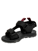Calzado infantil negro con velcros ajustables y suela antideslizante, ideal para caminatas ligeras.