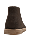 Botín marrón oscuro en cuero para hombre, suela beige, ideal para look casual y smart-casual.