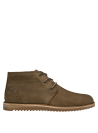 Botín de cuero taupe masculino, diseño rústico y sofisticado para uso diario.