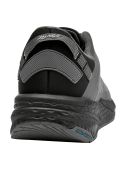 Zapatilla gris de hombre estilo running con detalles negros y logo en contraste.