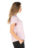 Tejido ligero y suave de polera rosada femenina, perfecta para el día a día.