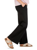 Pantalón negro de mujer con diseño versátil, destacando pretina clásica.