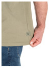 Polera casual verde de algodón con terminaciones prolijas.