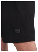 Traje negro clásico para hombre, acabado sobrio, adecuado para elevar un conjunto de oficina.