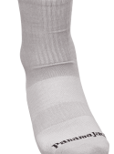 Calcetines unisex gris de algodón con puño acanalado y costuras planas para comodidad diaria.
