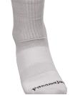 Calcetines unisex gris de algodón con puño acanalado y costuras planas para comodidad diaria.