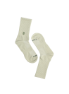Calcetines verdes unisex combinables con botines y falda midi.