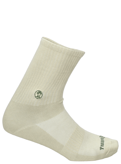 Combinación de materiales en calcetines verdes unisex para ajuste flexible.